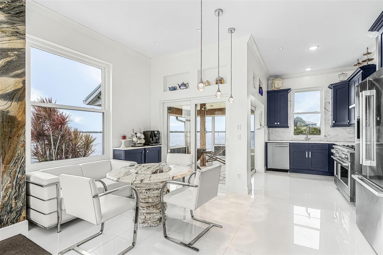 Kitchen and dining area featuring river and canal views