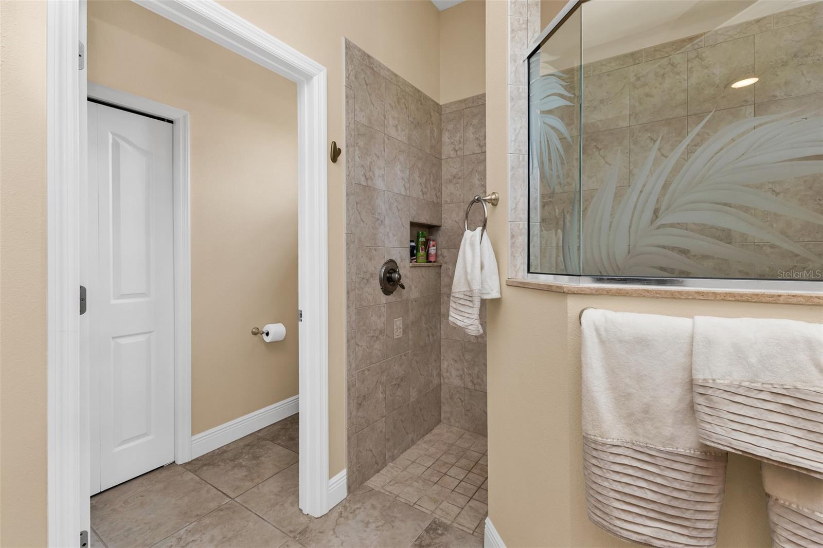 Master Bath, huge walk-in shower, water closet and linen closet shown