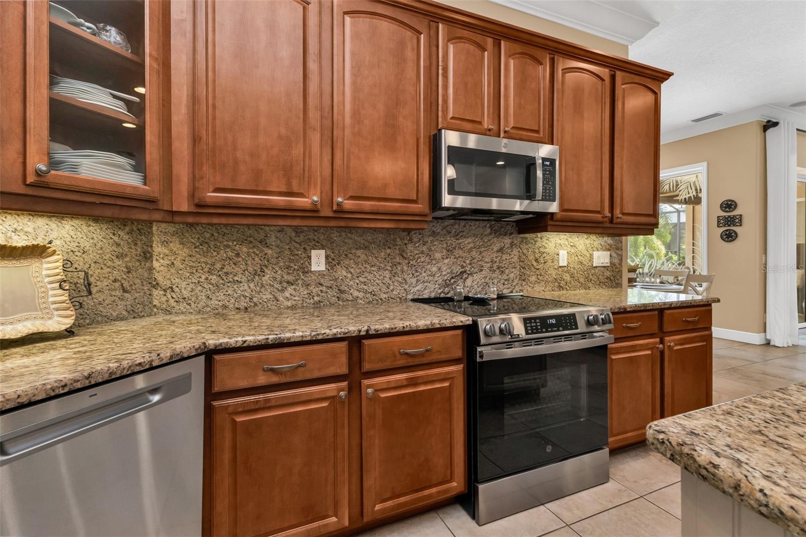 Soft close cabinetry, pull-out drawers on lower cabinets plus glass fronts on some uppers.