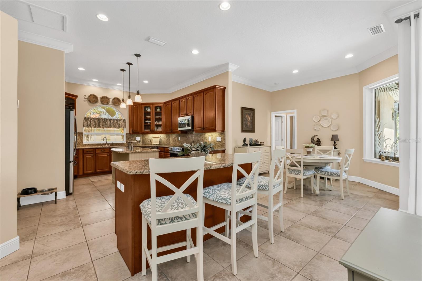 Tons of Can Lights! Soft close cabinetry, pull-out drawers on lower cabinets plus glass fronts on some uppers.