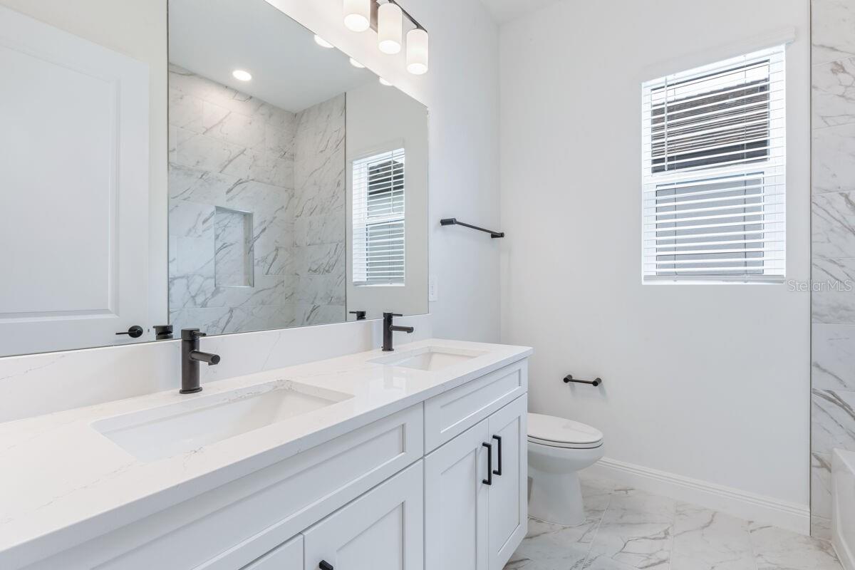 Bath 3- Photo description represents the model home of same floor plan.