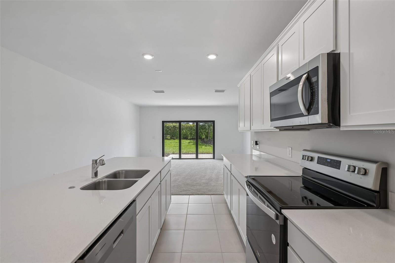 Kitchen to Living Room and Patio View