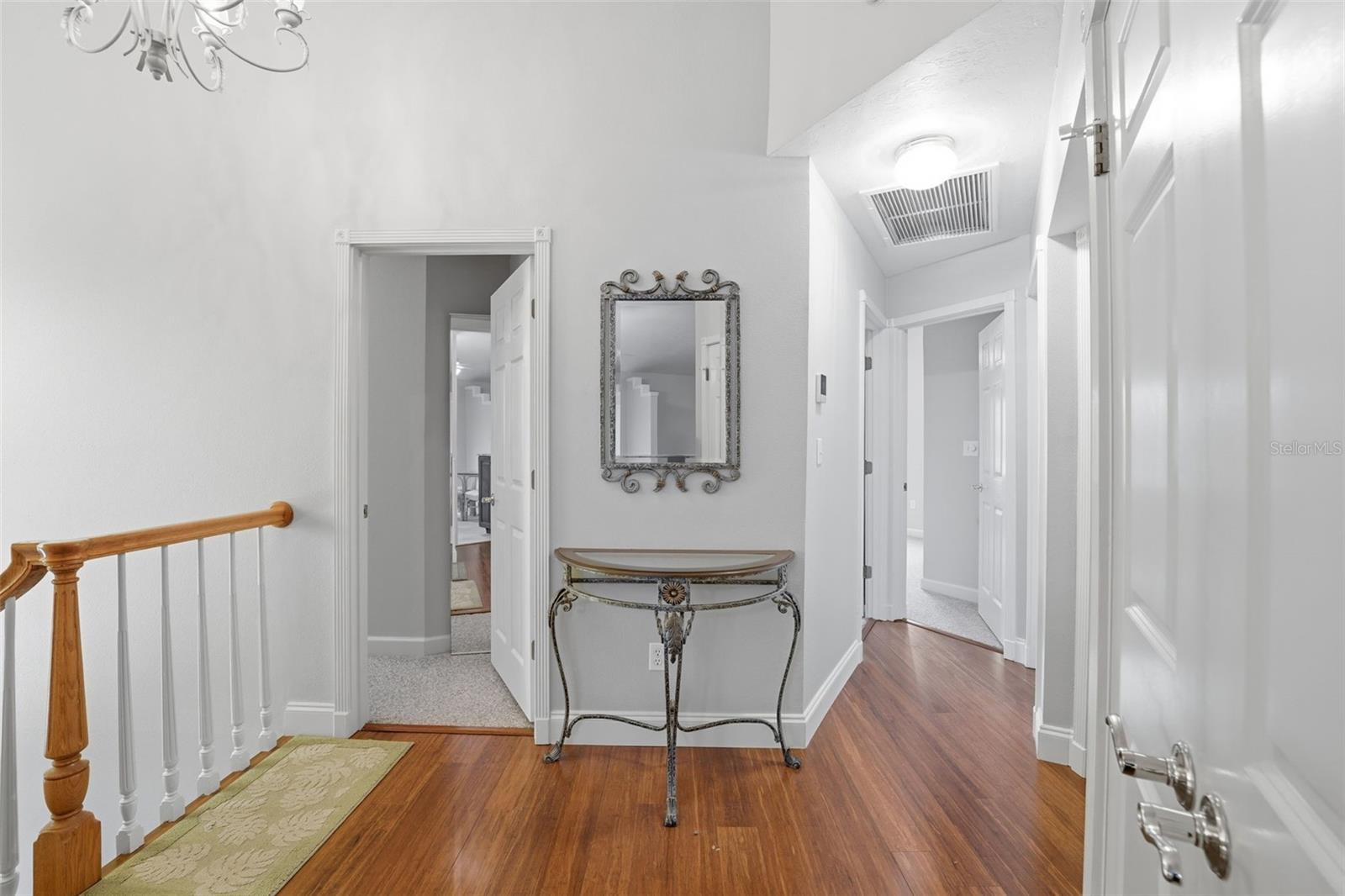 FROM FOYER TOWARD BEDROOMS
