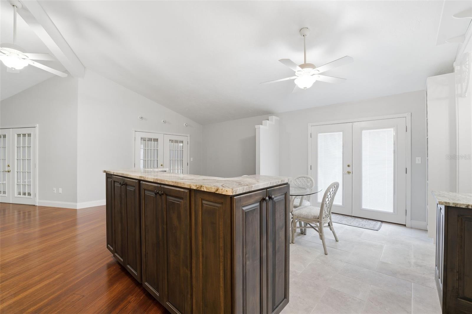 BREAKFAST ROOM TO DOORS TO DECK