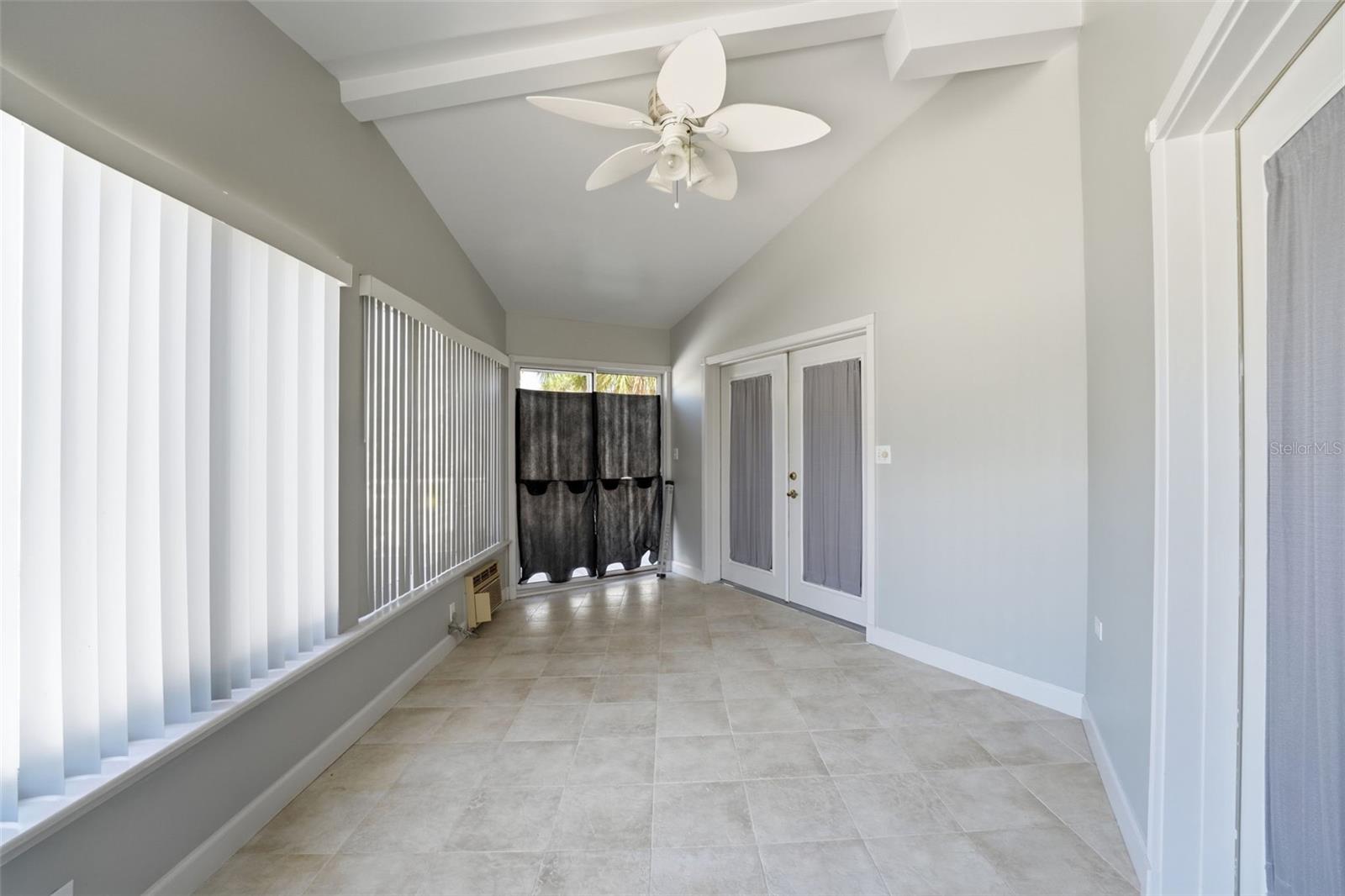 BONUS/SUNPORCH OFF LIVING & DINING ROOMSROOMS WITH SLIDERS TO DECK