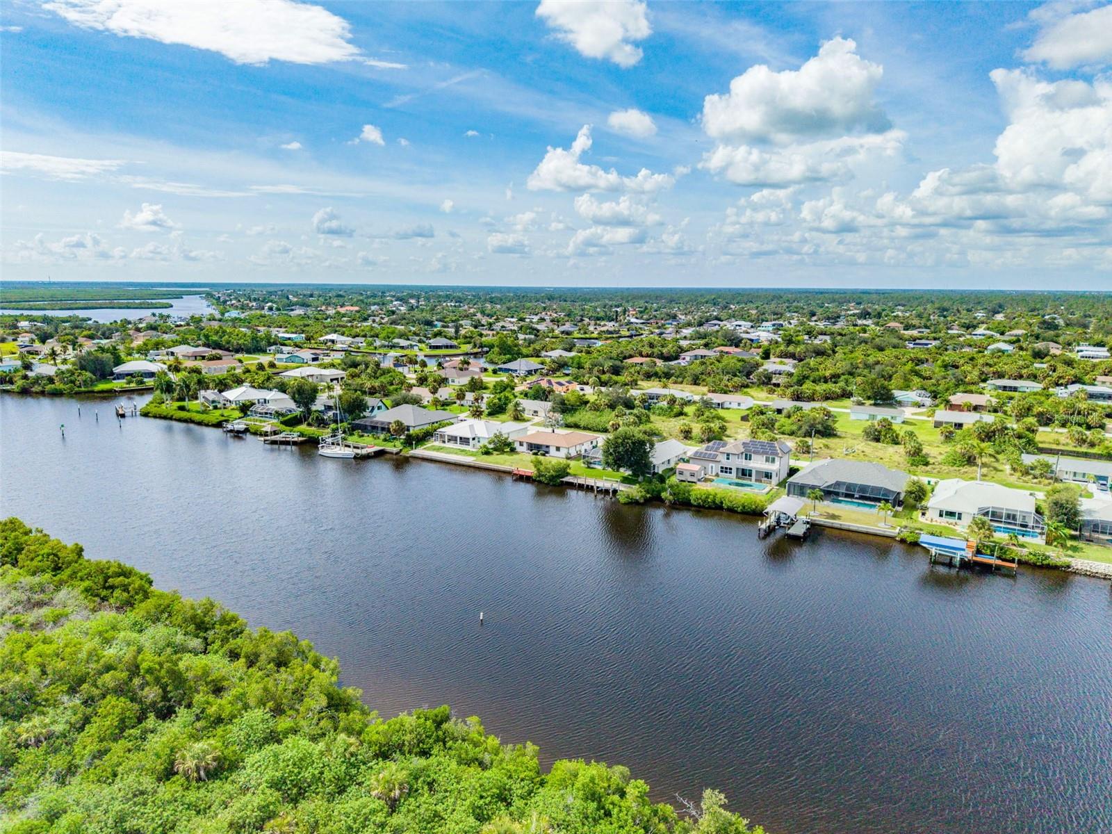 Prime Location on Wide Canal and Sail Boat Access