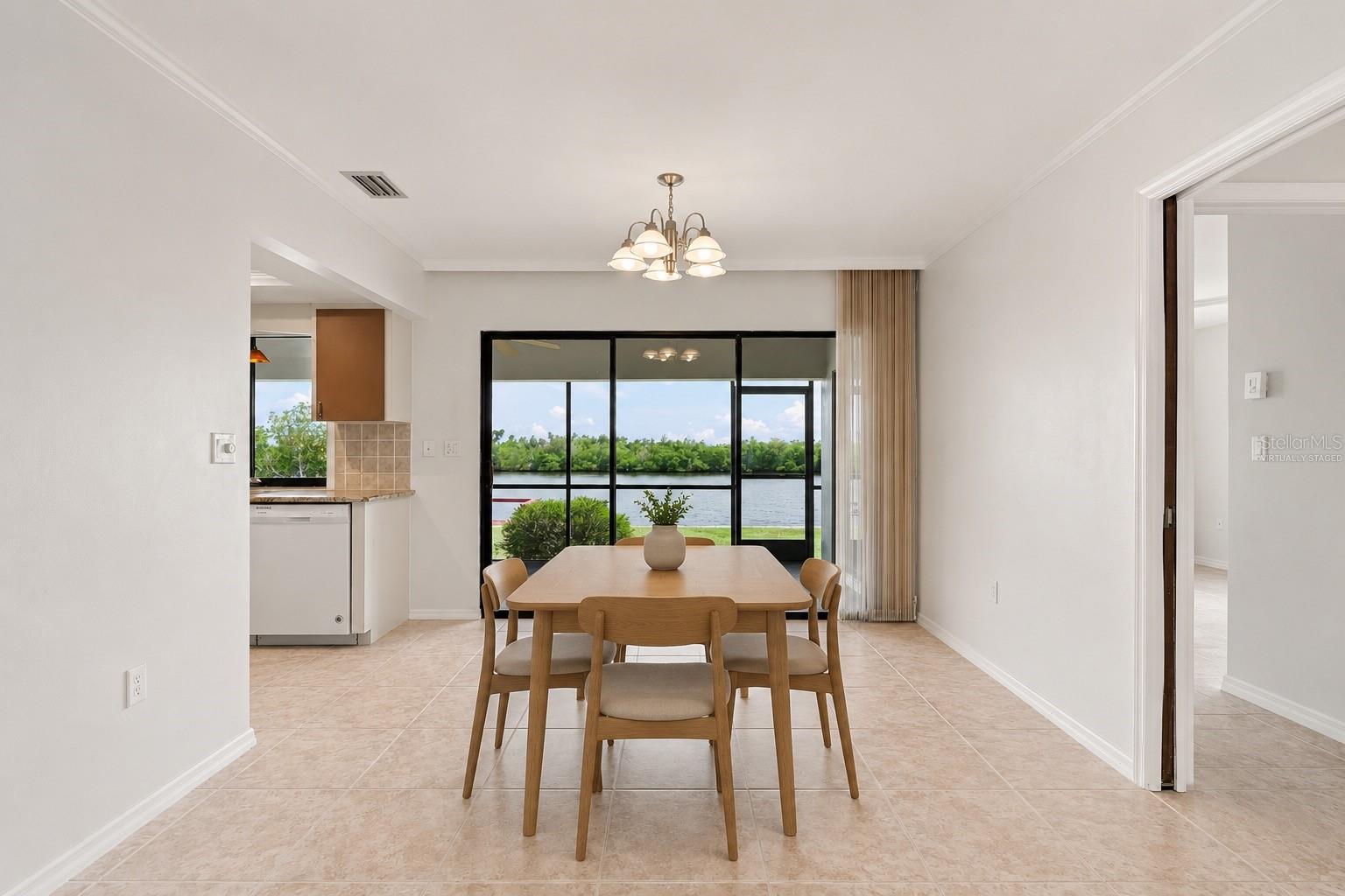 Virtually Staged Dining Room with Scenic Water Front Views
