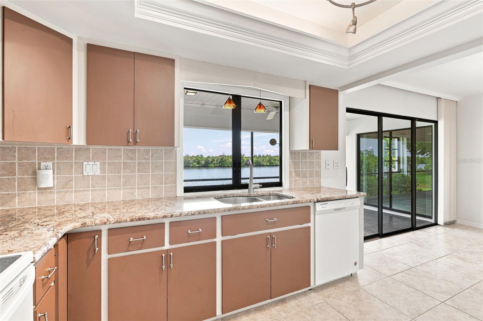 Kitchen Featuring, Granite Countertops,  Tray Ceiling and Waterfront views