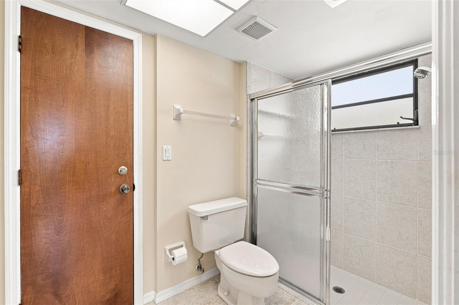 Ensuite Bathroom with Walk-in Shower and Side access to Garage