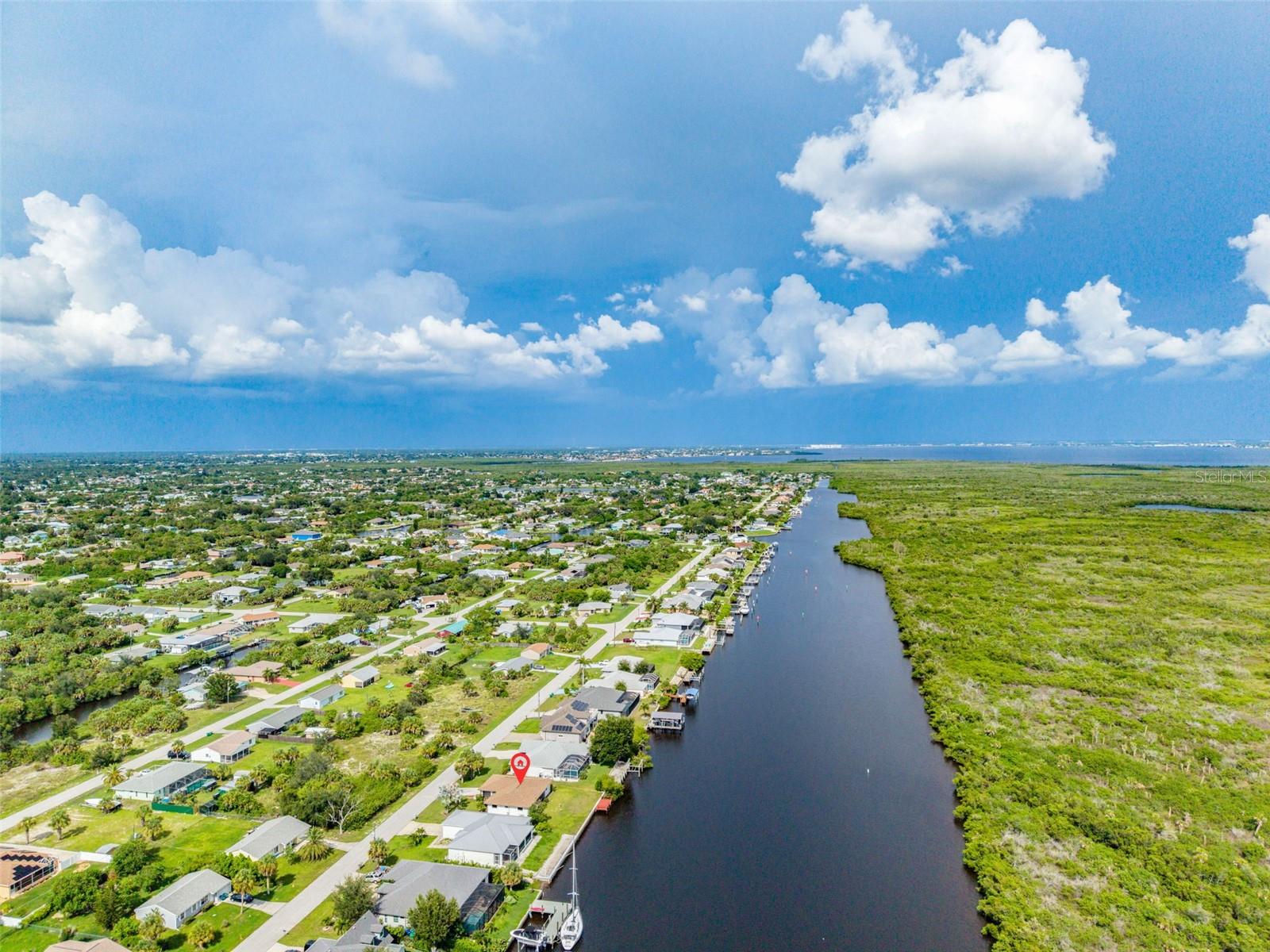 Prime Location on Wide Canal and Sail Boat Access