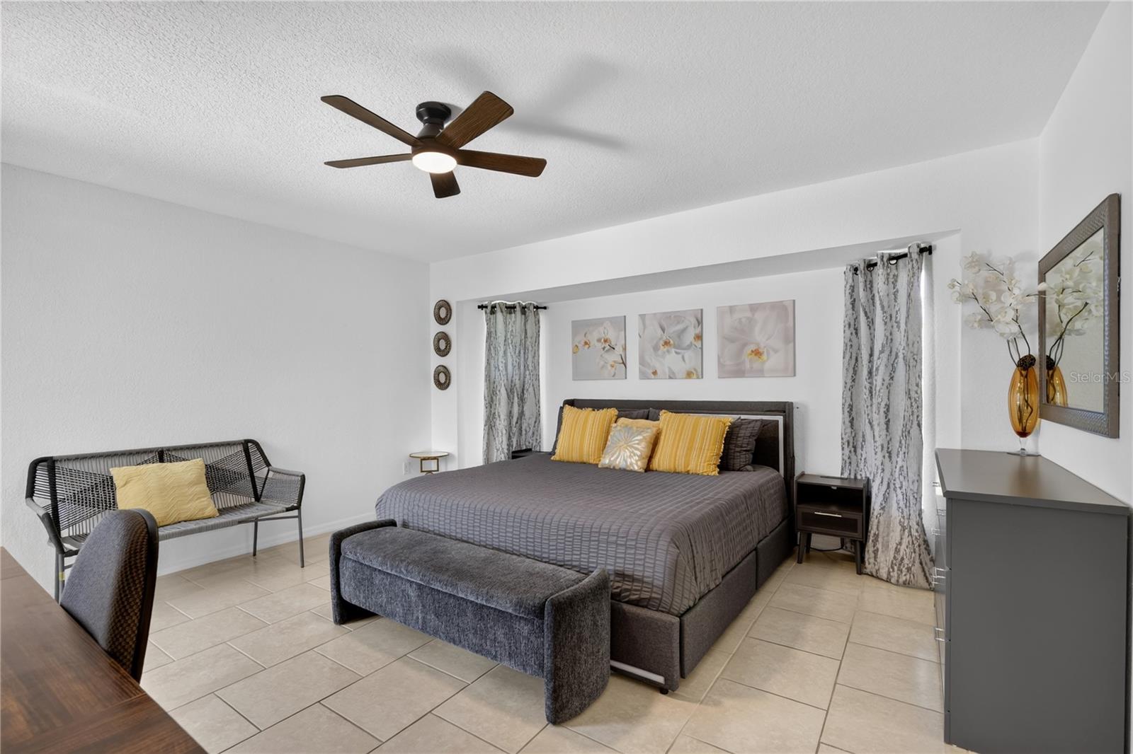 Primary Bedroom with sliding doors to the pool area.
