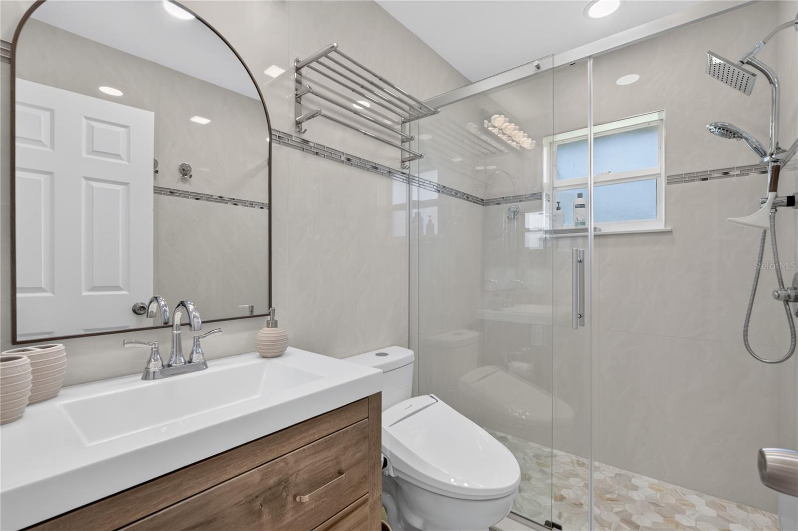Bathroom #2 with a glass shower doors.