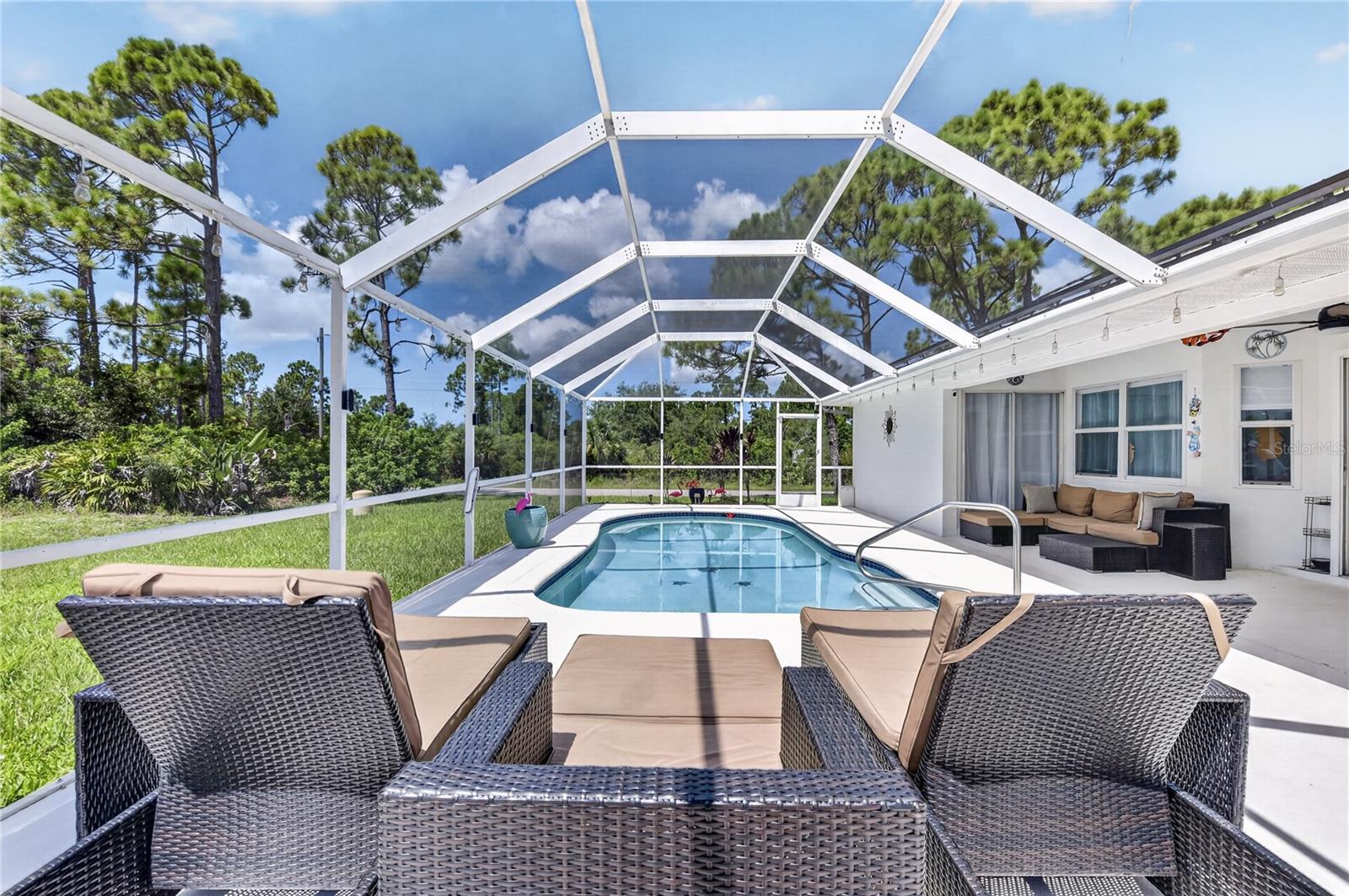Heated saltwater pool and lounge areas.