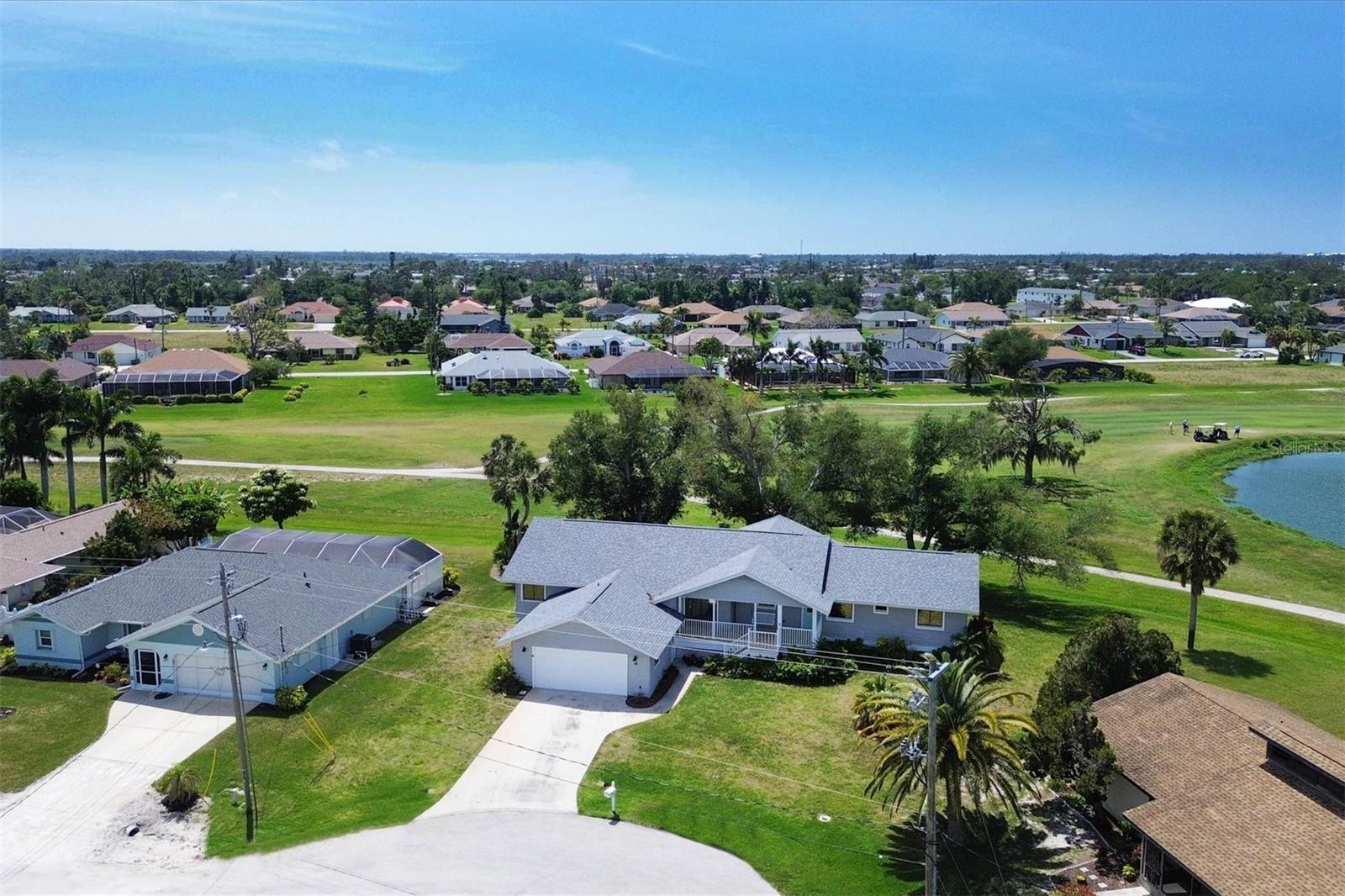 Home and golf course from above