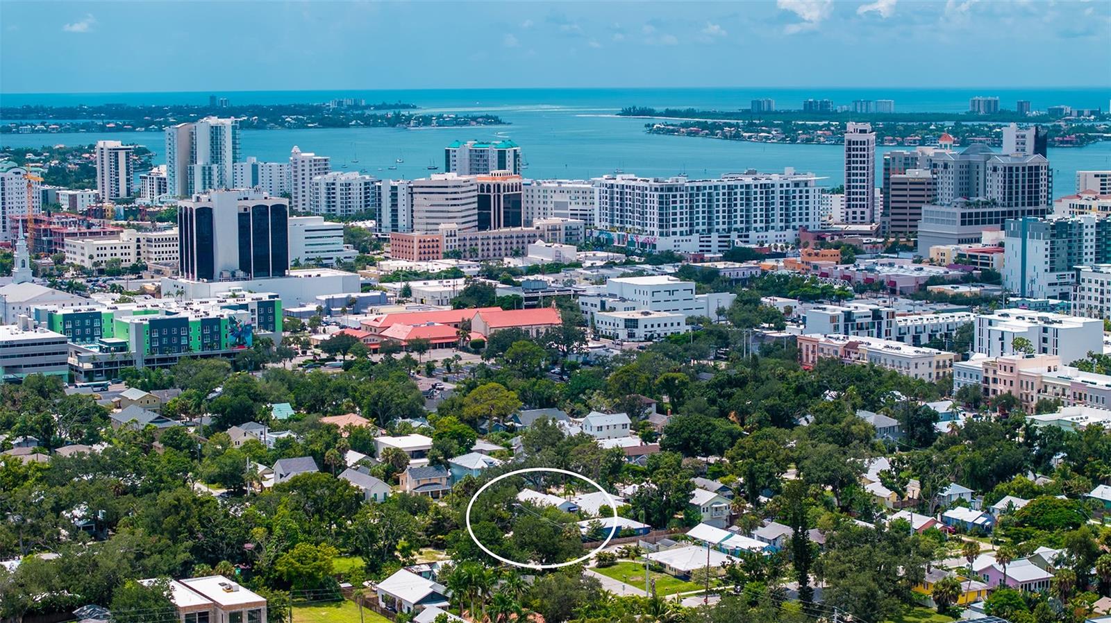 Aerial view showcases the home’s exceptional location just minutes from Downtown Sarasota, the waterfront, and the city’s vibrant cultural and dining scene.