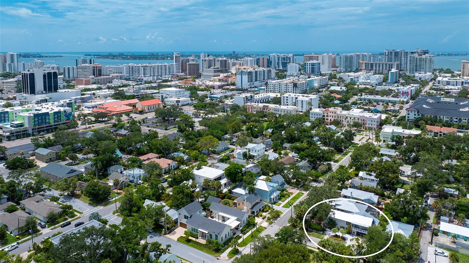 Aerial perspective highlights the property’s exceptional urban location surrounded by established neighborhoods and minutes from Downtown Sarasota.