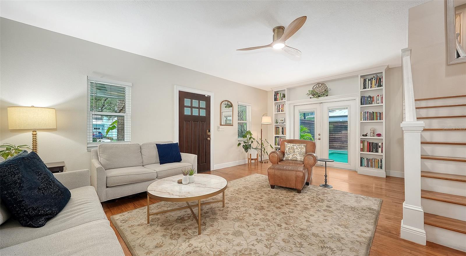Open-concept living space showcases elegant finishes, generous proportions, and seamless connection to the home’s private outdoor setting.