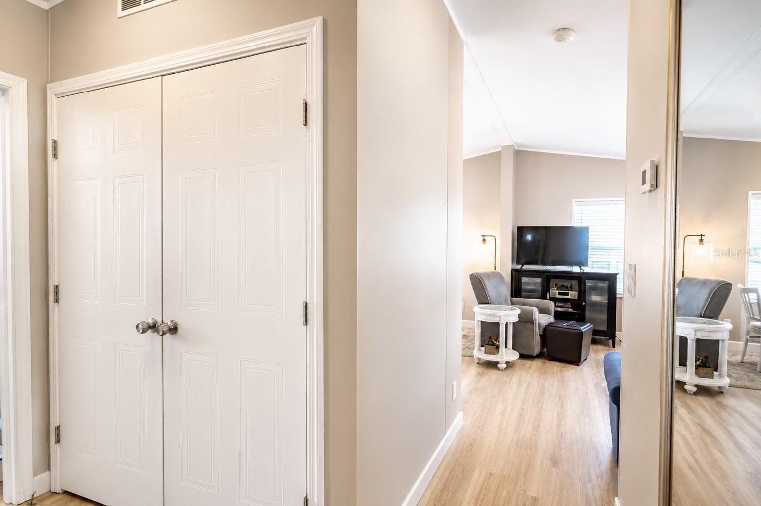 closet with washer and dryer