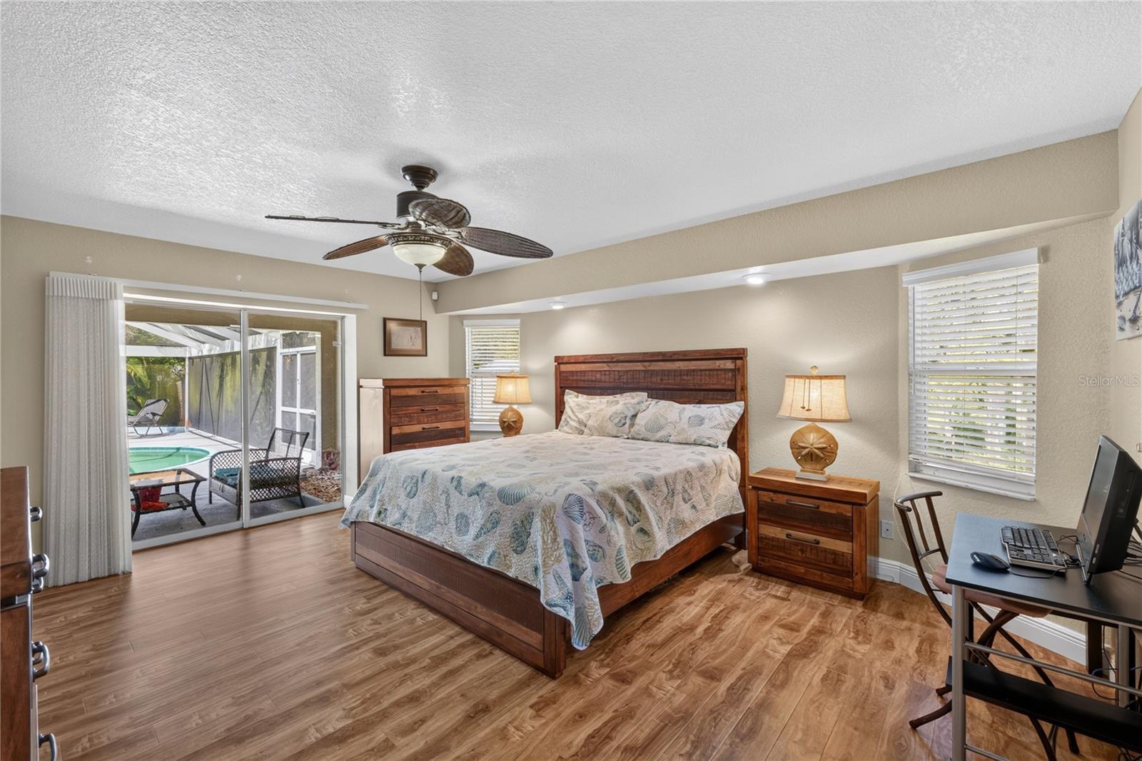 Primary Bedroom w/ sliders to lanai
