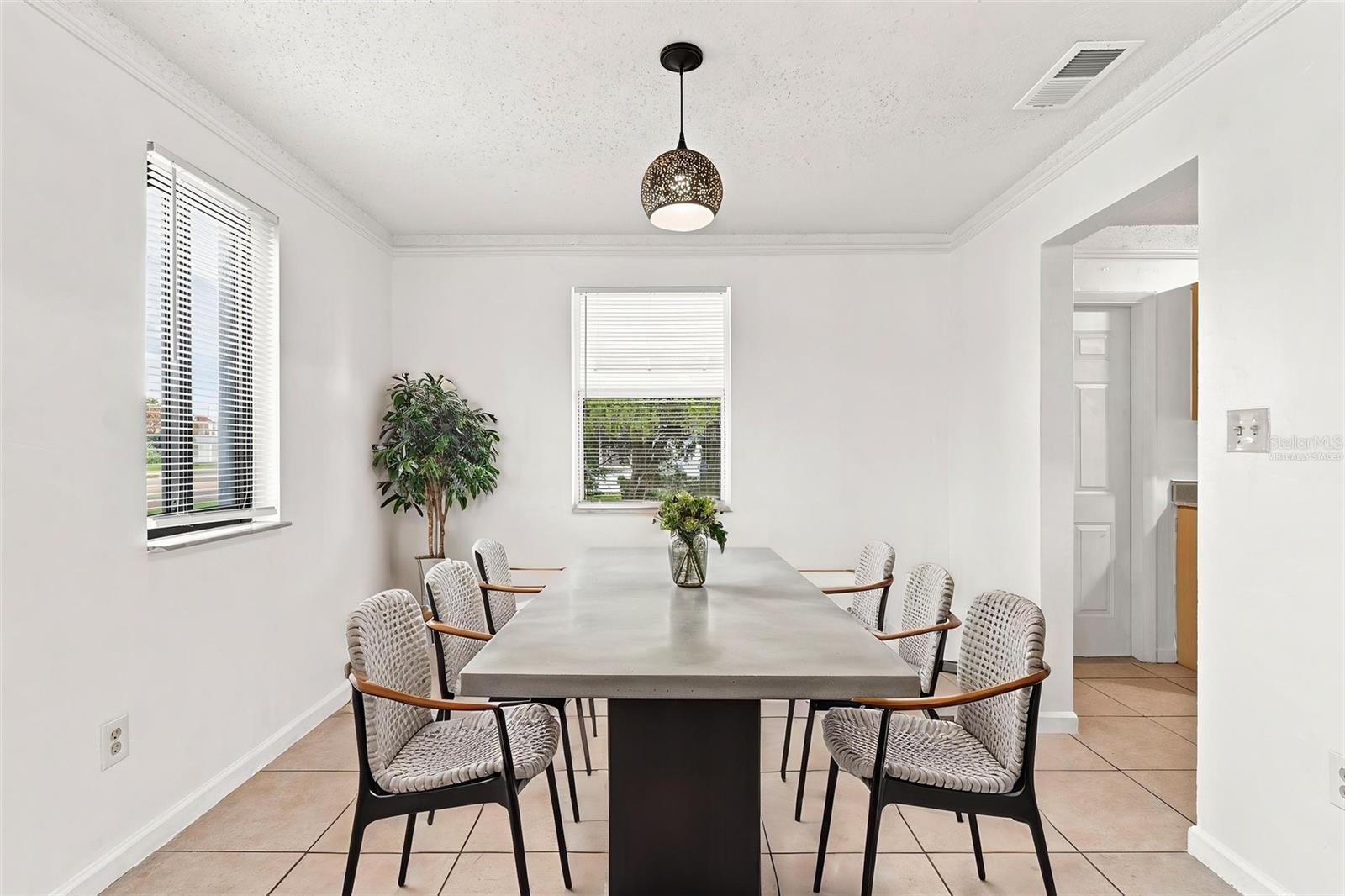 Virtually Staged Dining Area with Abundant Natural Light