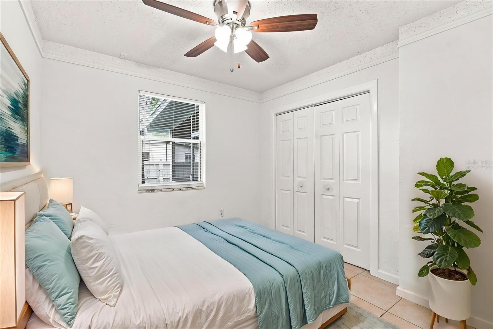 Virtually Staged Second Bedroom with Double Closet
