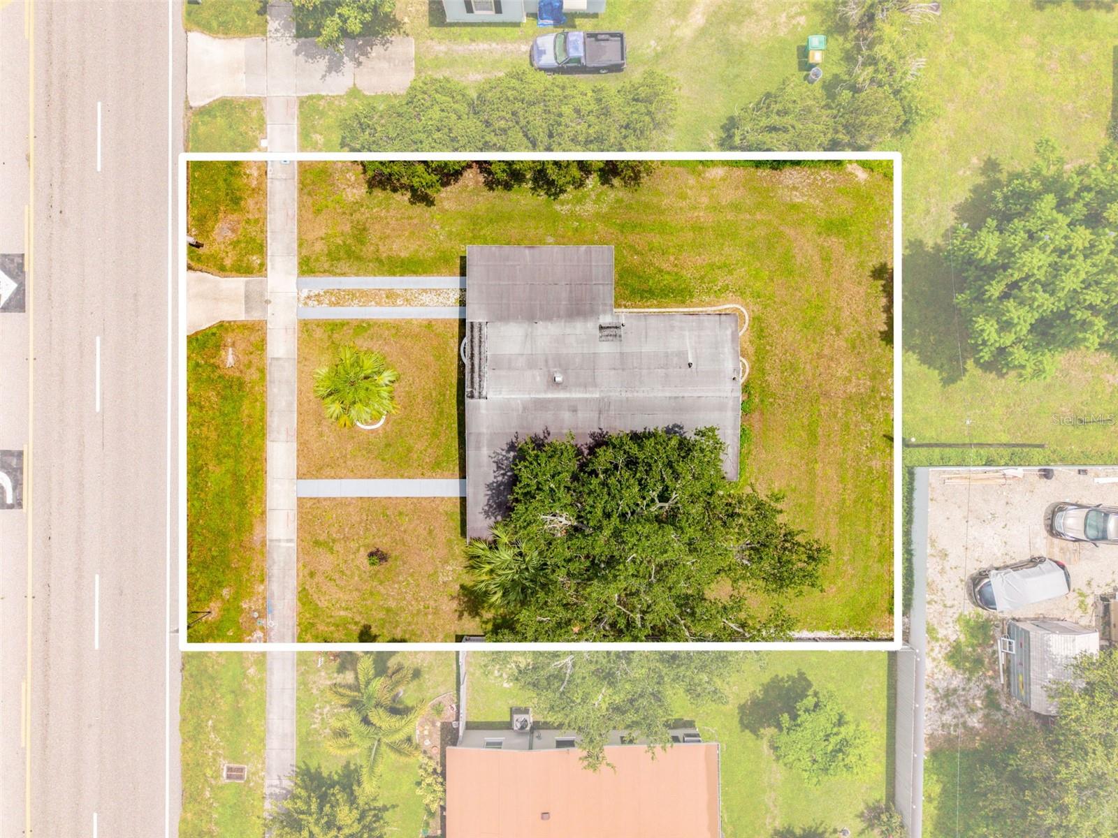 Aerial View of Property & Spacious Yard