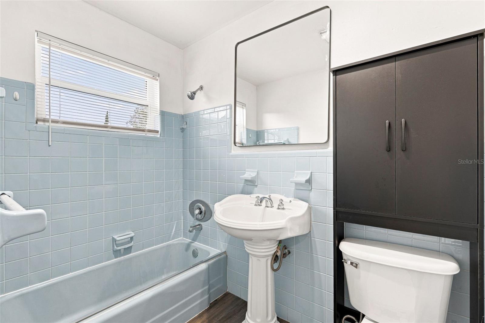 Bathroom with Vintage Style Blue Tile