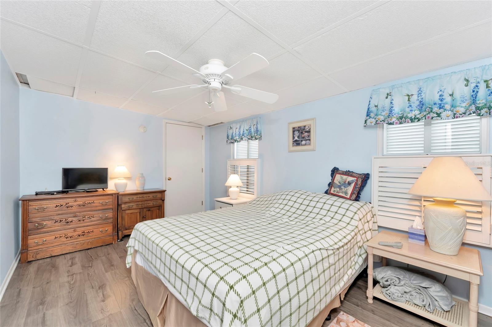 Bonus Room w/access to enclosed back porch, currently being used as a bedroom