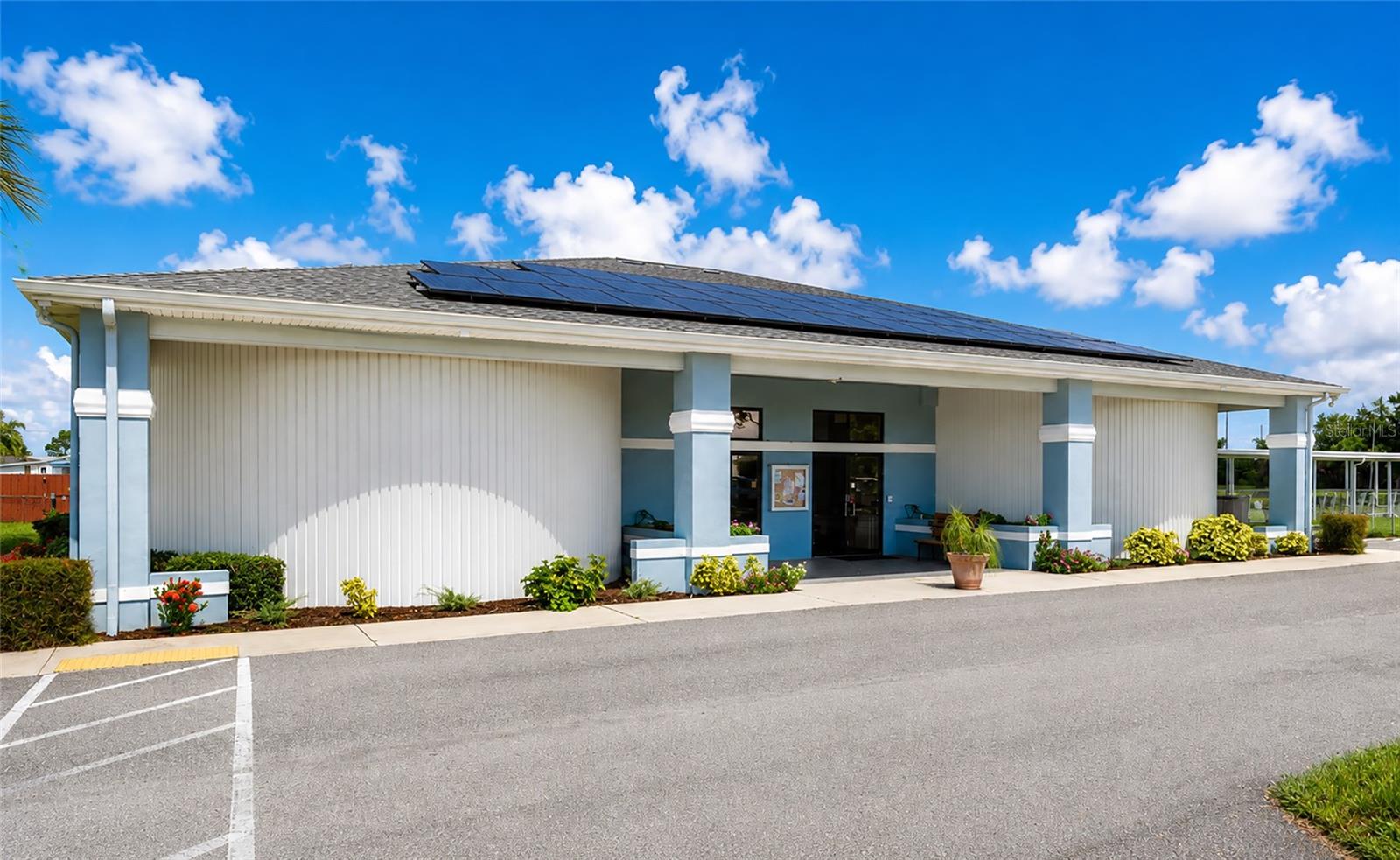 Entrance to the Community Clubhouse that has a library, full kitchen and gathering space