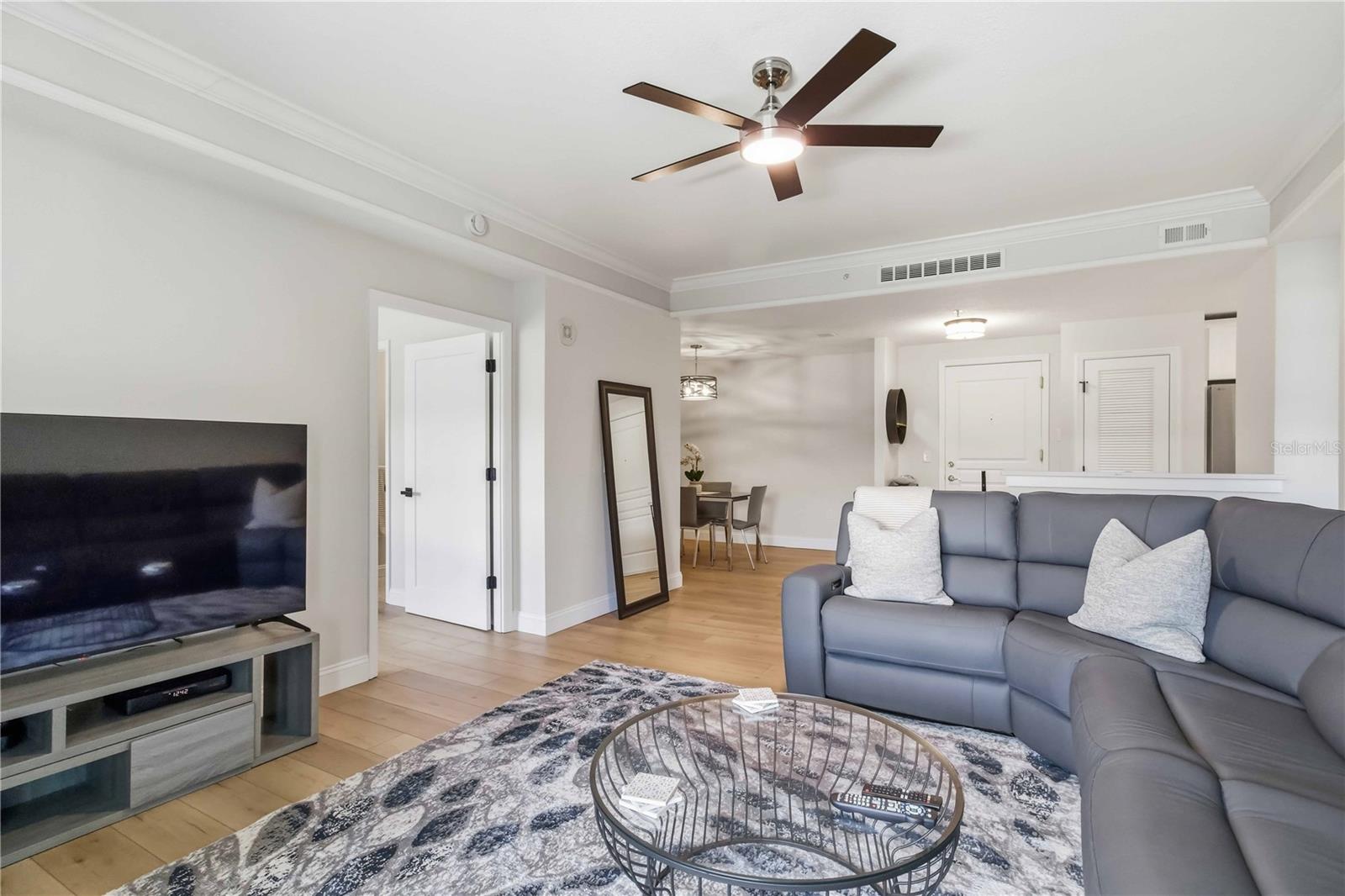 Living room with easy flow to kitchen and dining
