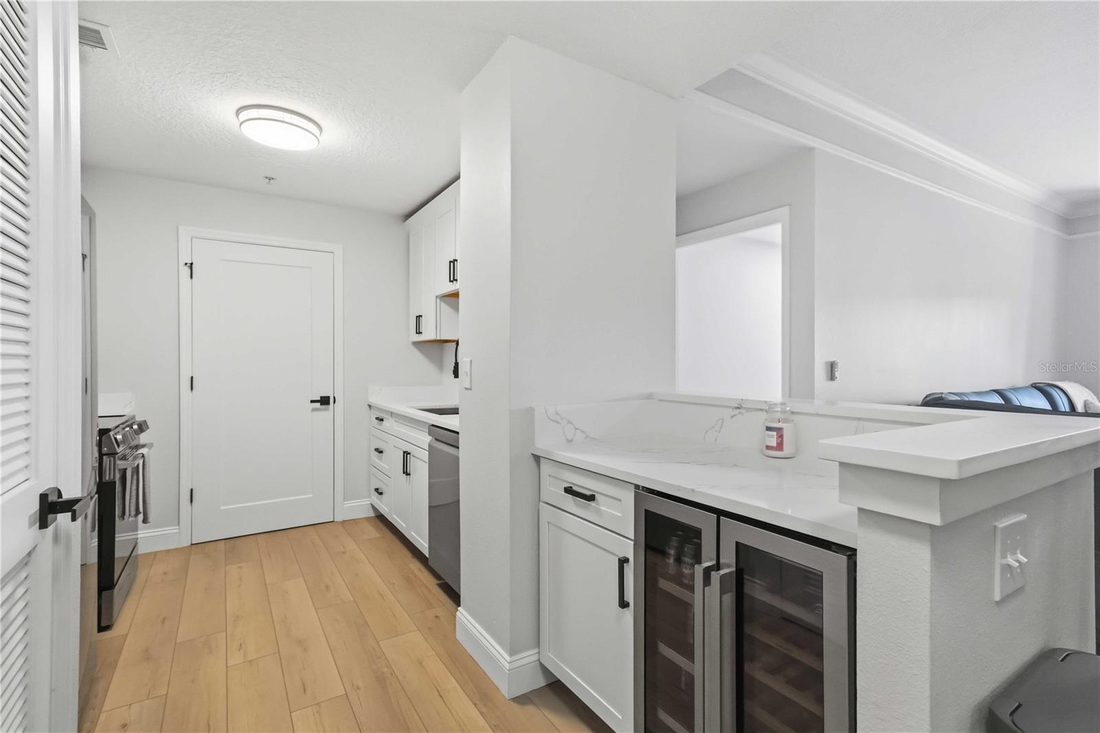Kitchen with bar fridge