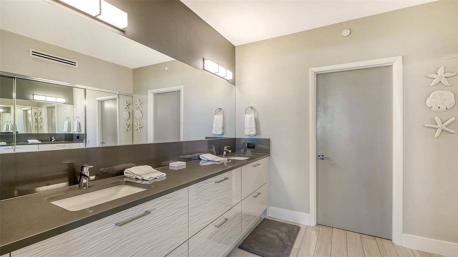 owner's bathroom with double sinks.