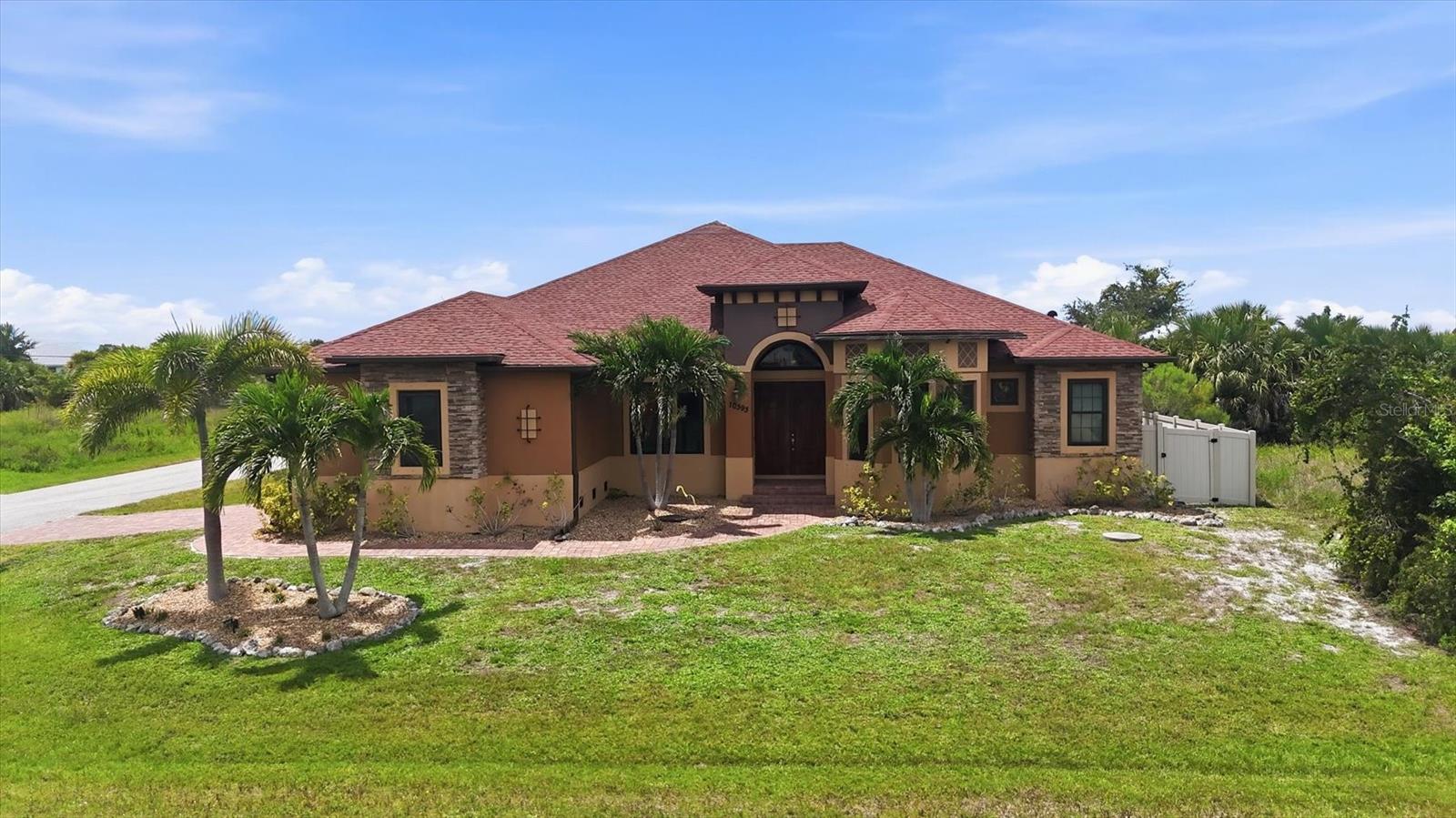 10393 Harlingen St, Port Charlotte, FL 33981 — photo 1 of 59