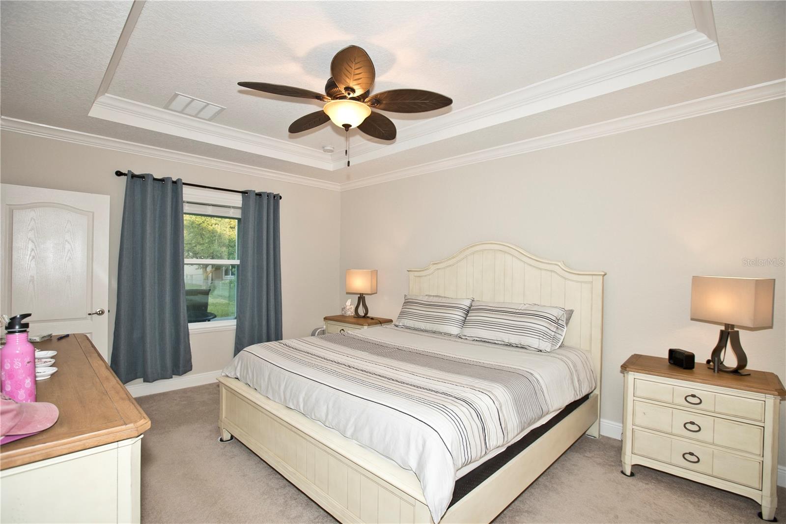Primary Bedroom with tray ceilings.