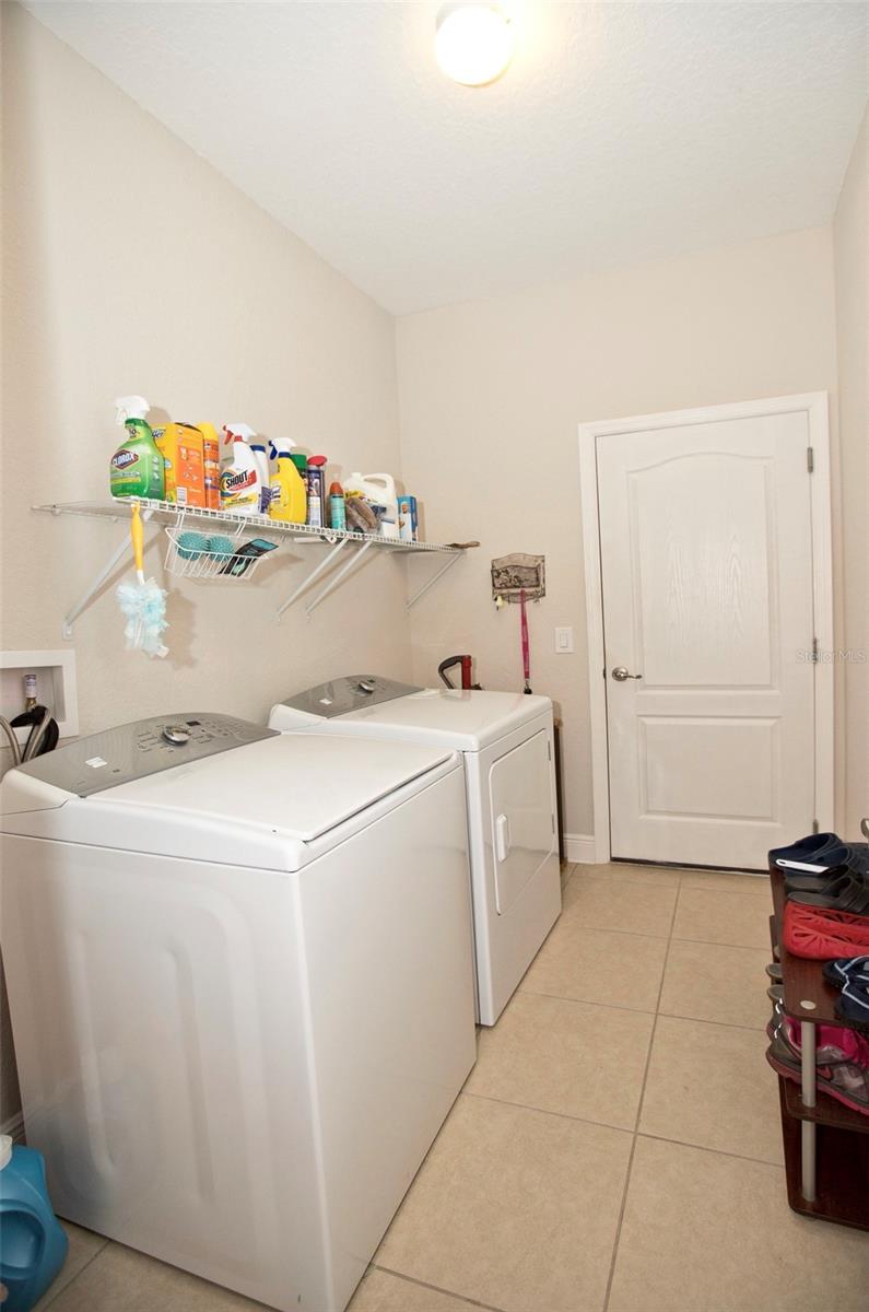 Inside laundry between garage and kitchen