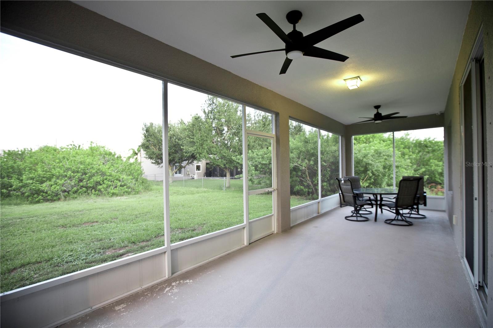 Covered and screened in 30 foot long lanai.