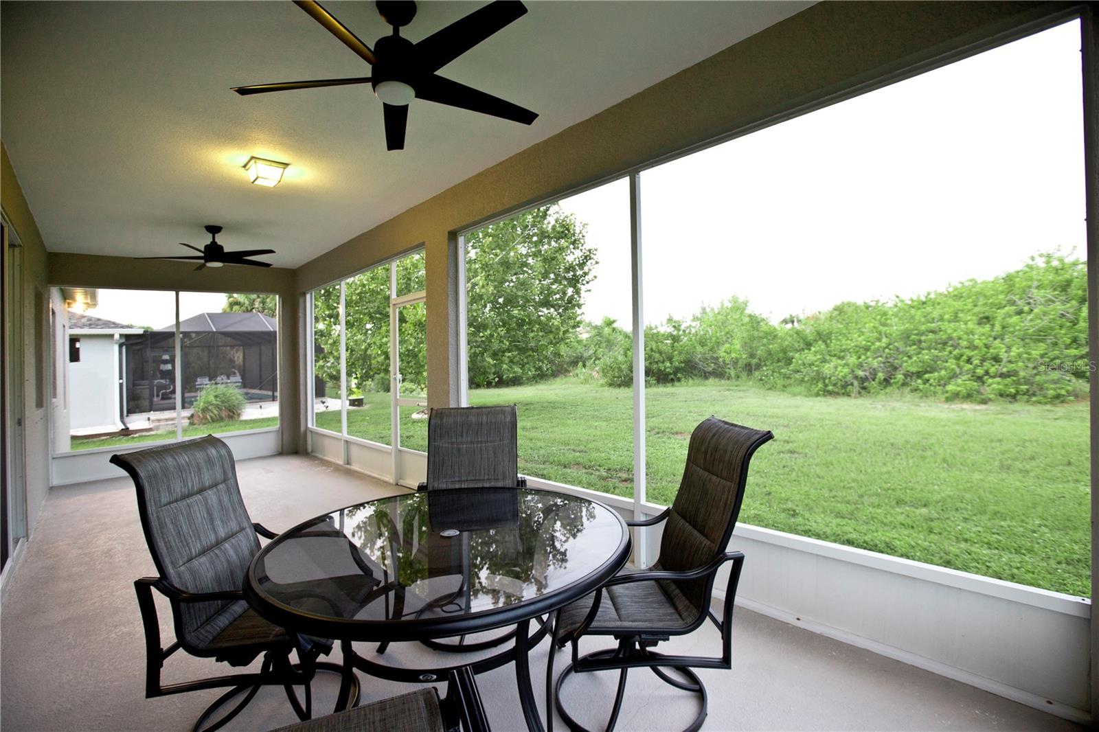 Covered and screened in 30 foot long lanai.