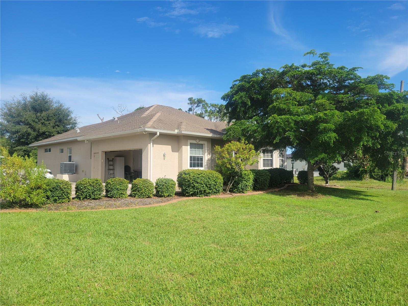 12 Tee View Ct, Rotonda West, FL 33947 — photo 1 of 28