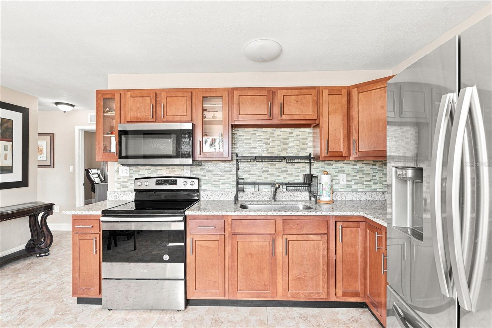 Plenty of Cabinet Storage, with Tile Backsplash