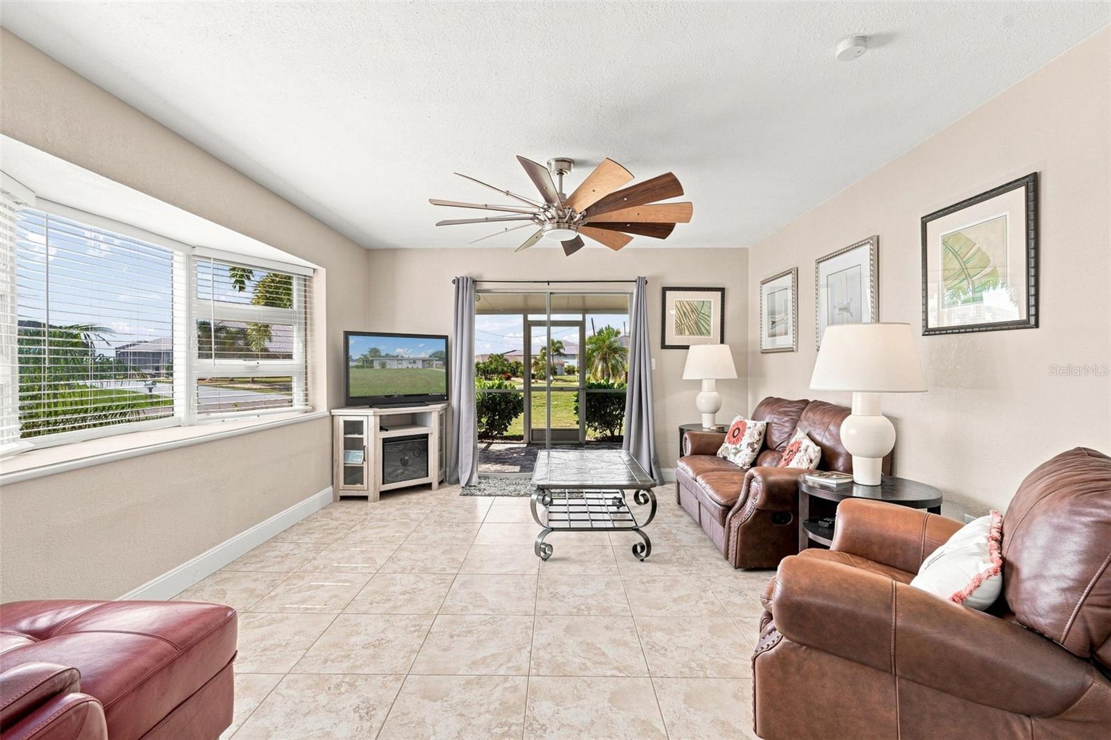 Living Room with Abundant Natural Light & Outdoor Access