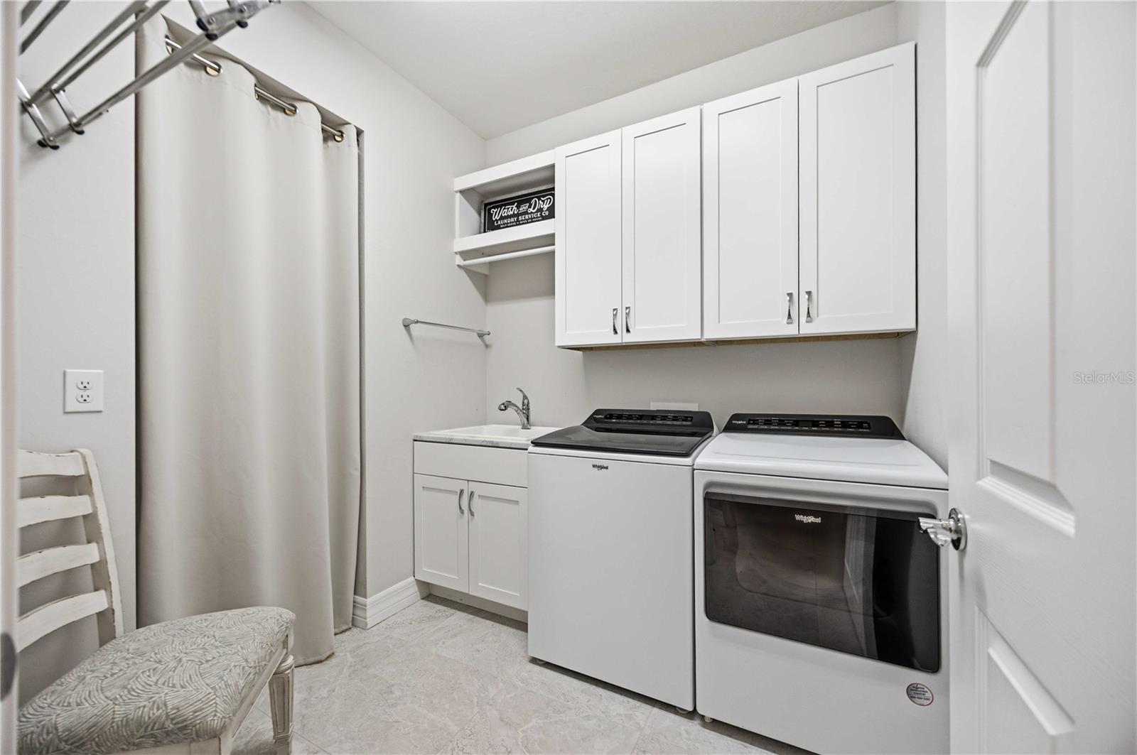 Large Laundry with storage closet