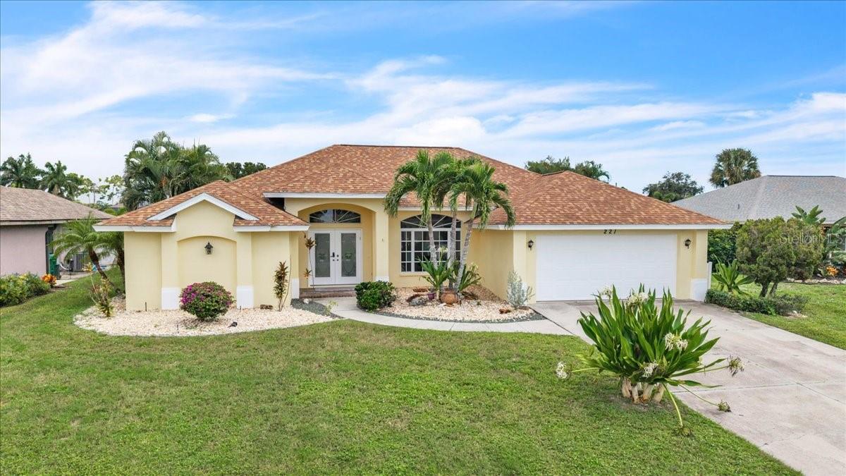 221 Sportsman Rd, Rotonda West, FL 33947 — photo 1 of 46