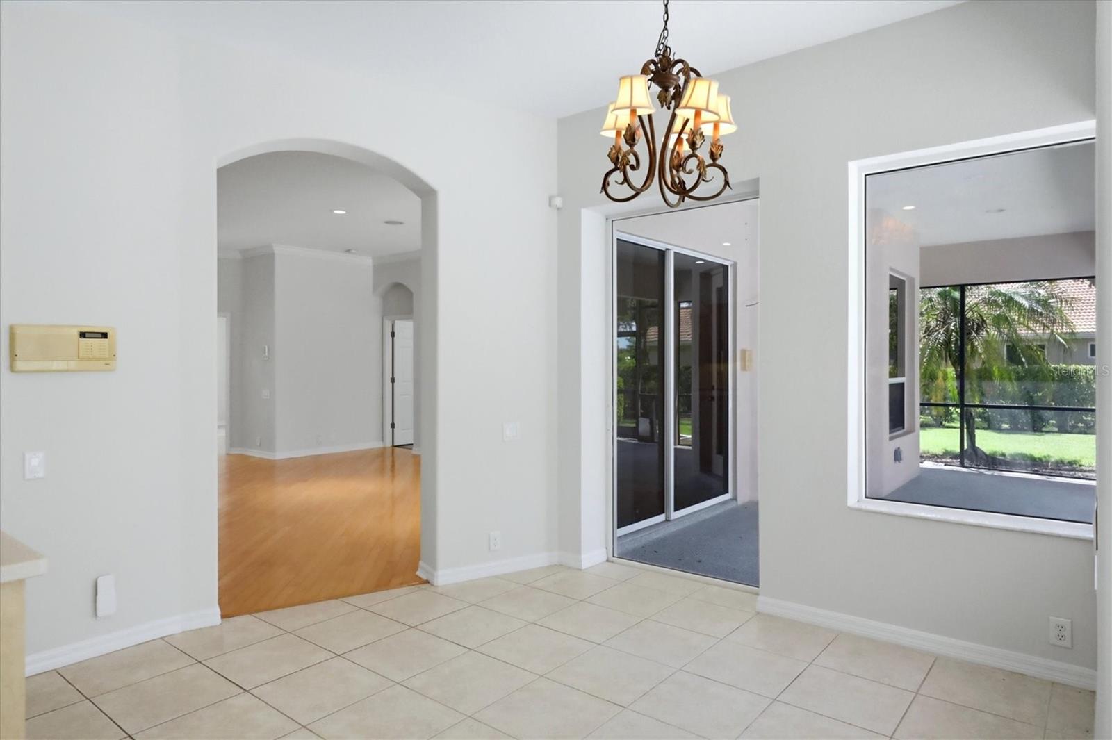 Breakfast nook with slider to pool/lanai