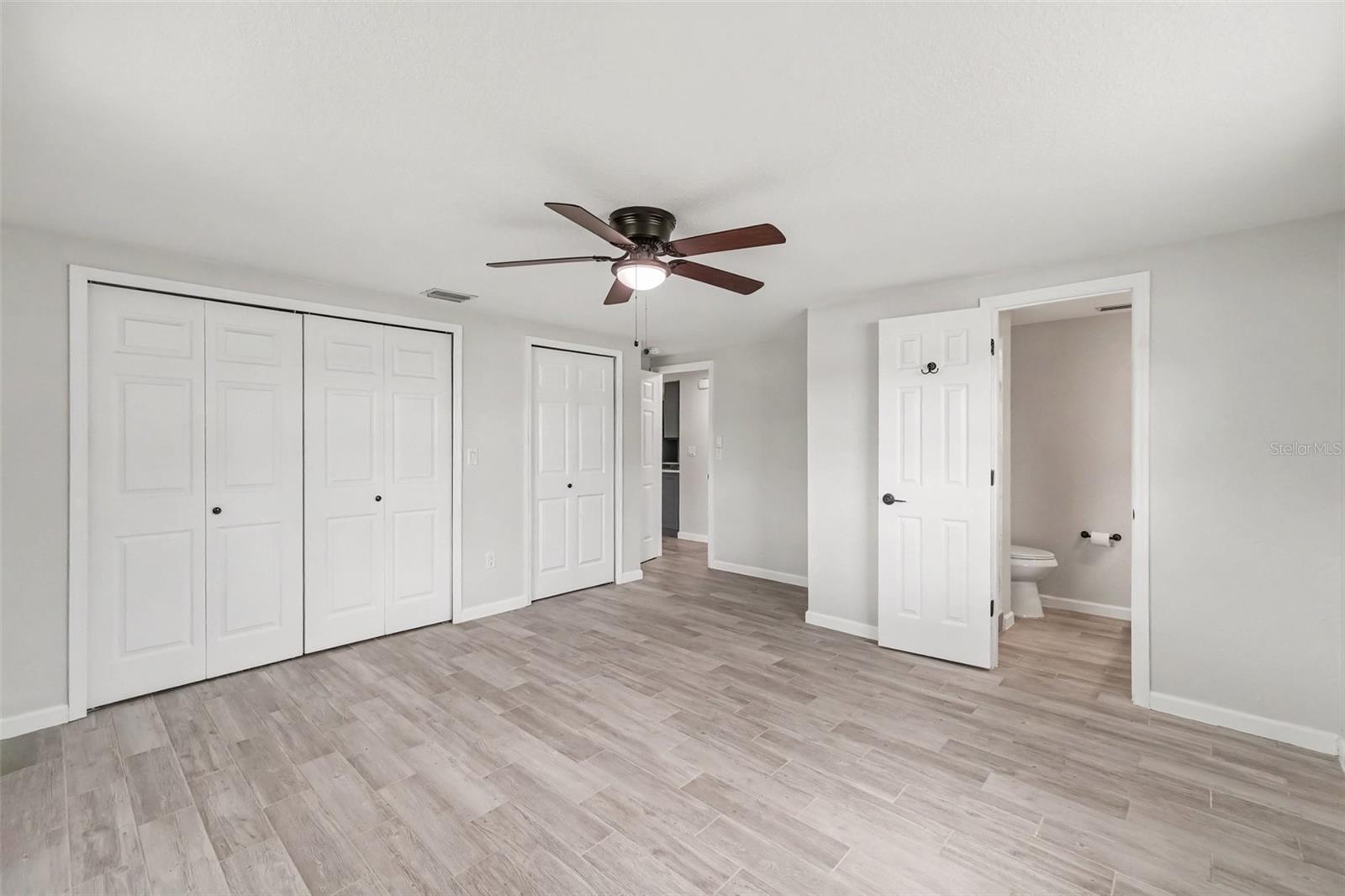 Alternate view of primary bedroom, plenty of closet space