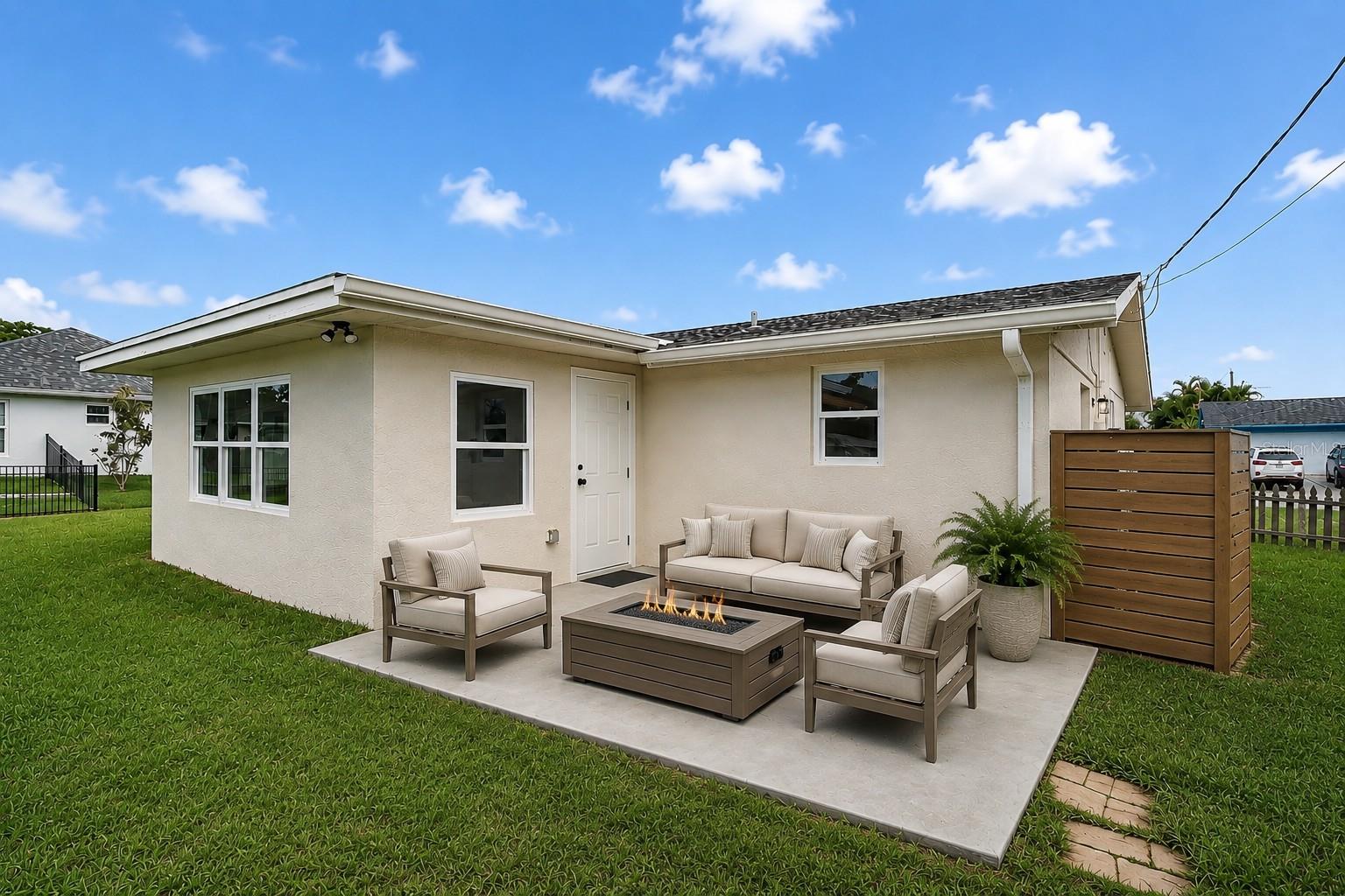 Back of house Patio (Furniture/decor added