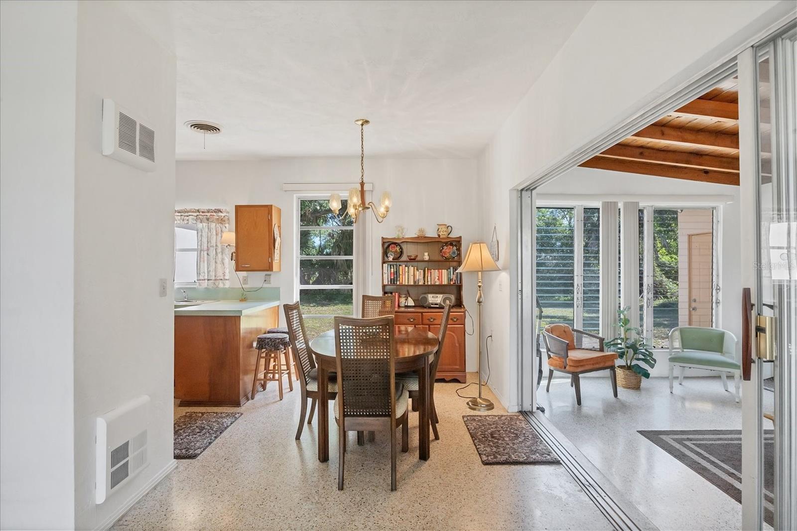 Dining room connected to kitchen and living room