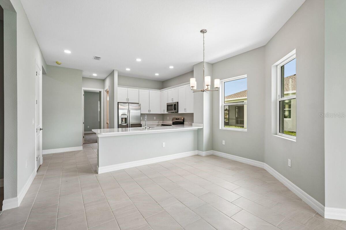 Kitchen-Photo description represents the model home of same floor plan.