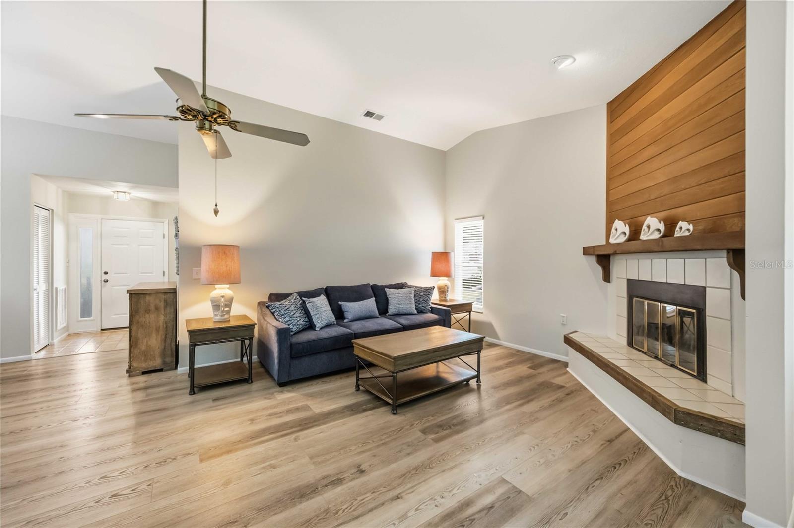 Living Room with fireplace and vaulted ceiling