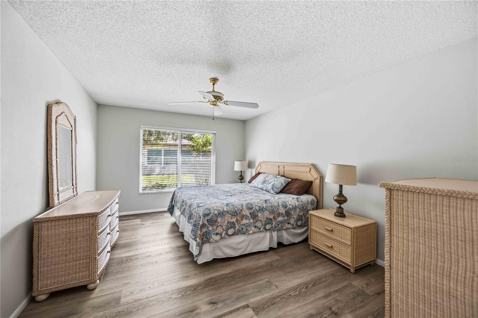 Primary Bedroom with dual closets and en suite bathroom