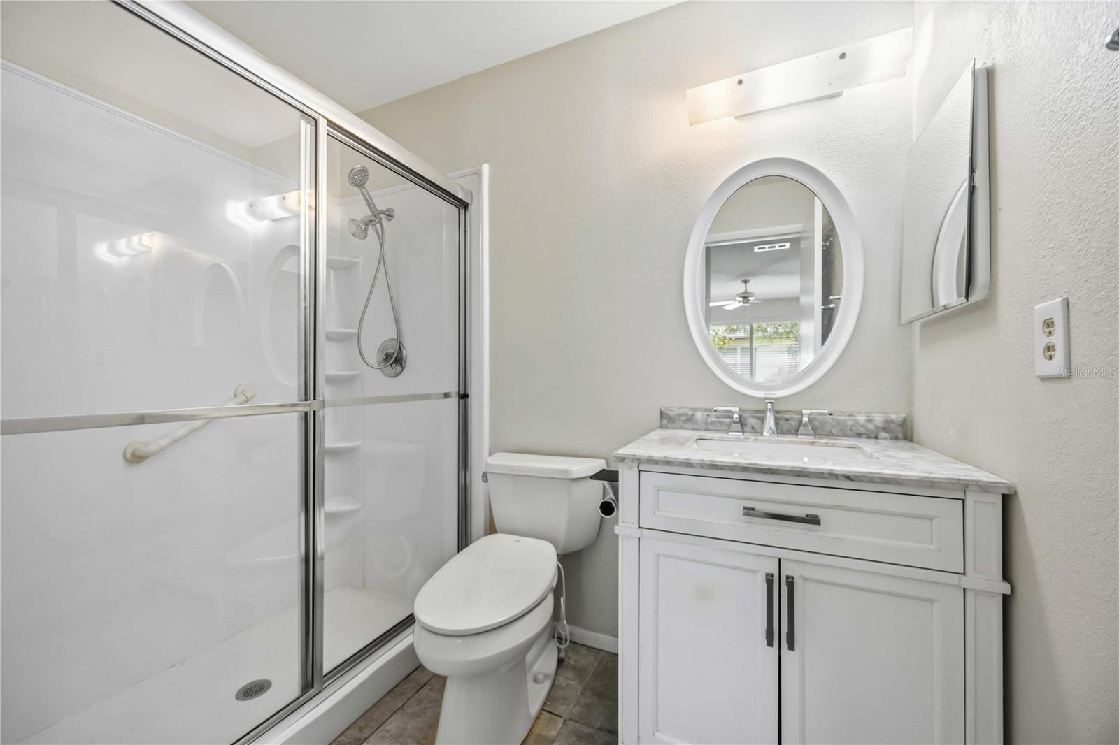 Primary Bathroom with walk-in shower